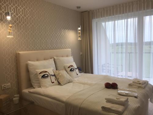 Postel nebo postele na pokoji v ubytování Westin House Apartamenty Baltic Premium