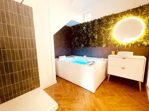 Kúpeľňa v ubytovaní Le Jungle SPA ****