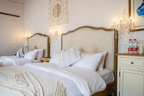 Katil atau katil-katil dalam bilik di Boke B&B Xihu