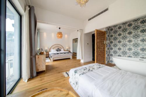 Katil atau katil-katil dalam bilik di Boke B&B Xihu