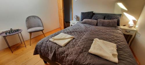 A bed or beds in a room at Hi-Bp Garden city Batsanyi Apartment 3 Rooms, Apartment upstairs near the city train with FREE PARKING