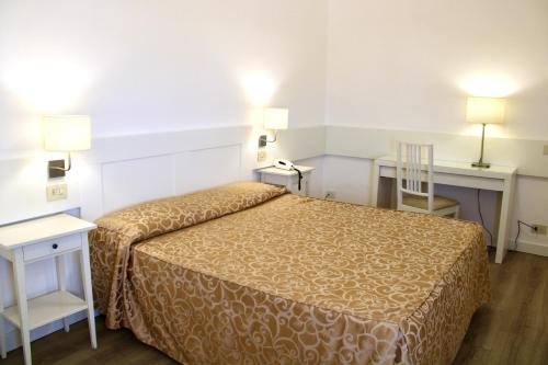 Postel nebo postele na pokoji v ubytování Hotel Esplanade