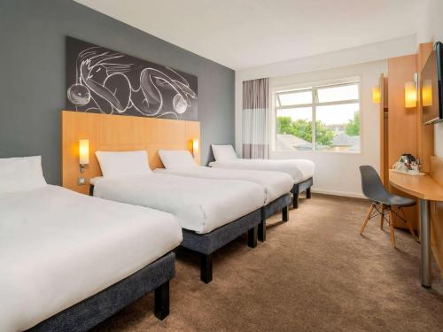 Tempat tidur dalam kamar di ibis York Centre