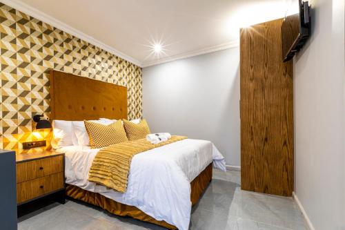 Katil atau katil-katil dalam bilik di 5th On Preston Guest House