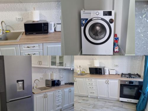a kitchen with a washing machine and a microwave at Luxurious apartment with 3 rooms and 2 bathrooms in Corabia in Corabia