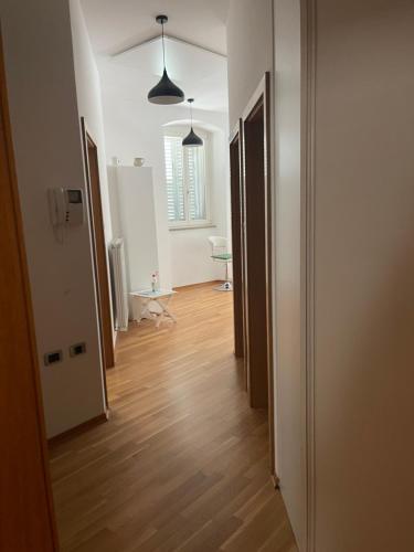 a hallway of a room with a hard wood floor at Koper Sea Apartment in Koper