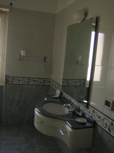 Koupelna v ubytování Albergo Carpino