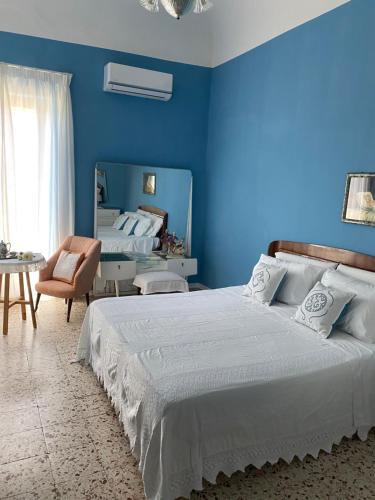 A bed or beds in a room at A casa di Nonna Mela