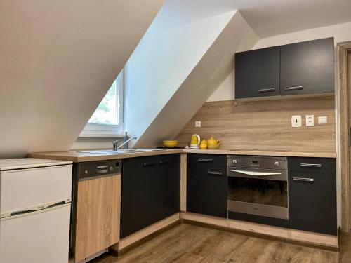 Кухня или мини-кухня в Apartmán Zelený dom 43 (2)
