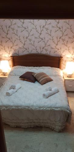 En eller flere senger på et rom på Guesthouse Mare&Monti Castelforte