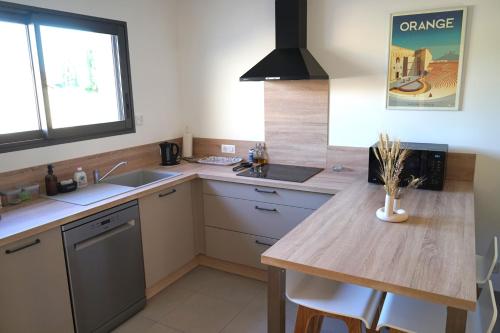 Η κουζίνα ή μικρή κουζίνα στο Maison chaleureuse en Provence