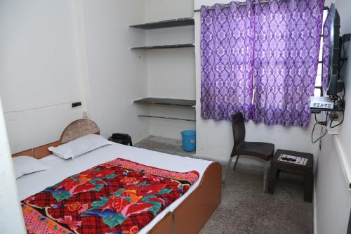 Ένα ή περισσότερα κρεβάτια σε δωμάτιο στο Hotel Shri Karni Vilas & SPA
