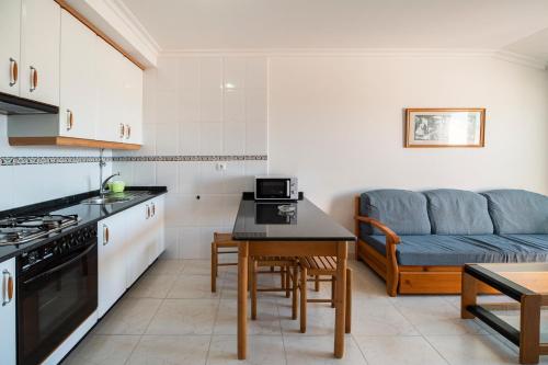 Kuchyňa alebo kuchynka v ubytovaní Apartamento La Perla