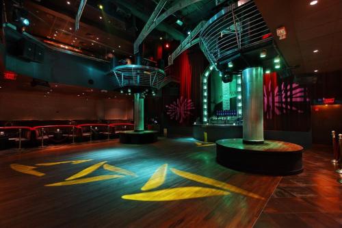 a dance floor in a theater with a stage at Tropicana Atlantic City, A Caesars Destination in Atlantic City