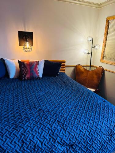 Postel nebo postele na pokoji v ubytování Sundance Motel