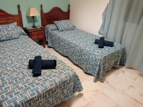 Postel nebo postele na pokoji v ubytování Apartment by the sea