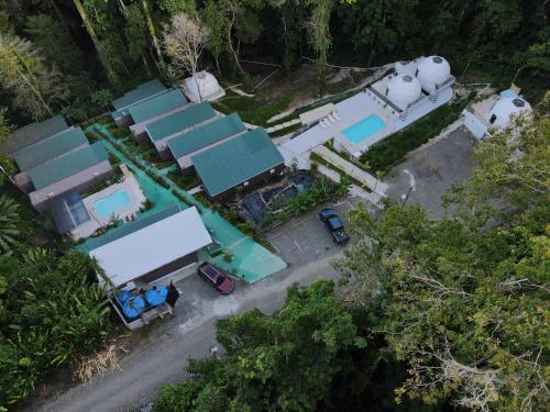 an overhead view of a house with a swimming pool at HOTEL, VILLAS y GLAMPINGS MYA -PUERTO VIEJO, Limon, CR in Puerto Viejo
