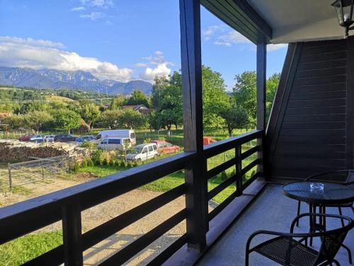 a balcony with a view of the mountains at New Wolf in Bran