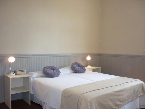 Posteľ alebo postele v izbe v ubytovaní Hotel Du Helder