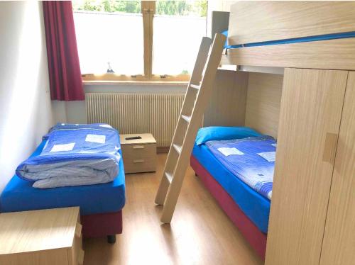 Katil dua tingkat atau katil-katil dua tingkat dalam bilik di Appartamenti Detomaso