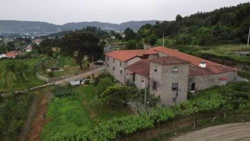 an aerial view of a house on a hill at Quinta do Pinheiro in Guimarães