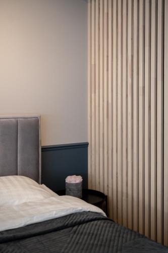 Postel nebo postele na pokoji v ubytování Tare apartment