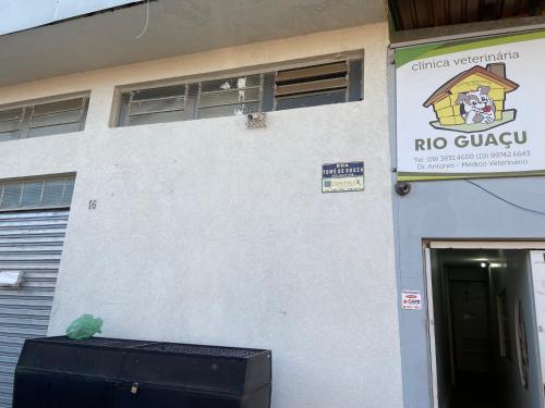 a white building with a no gucci sign on it at Apart Hotel Seg Total Lofts Encantadores in Mogi-Guaçu