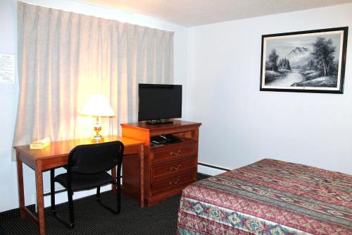 TV a/nebo společenská místnost v ubytování Tel Star Motel