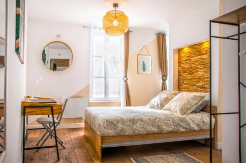Llit o llits en una habitació de Eden-Apart