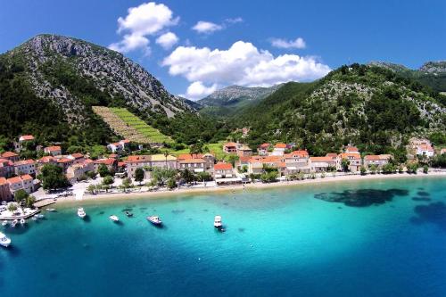an aerial view of a small island in the water at Double Room Trstenik 4566c in Trstenik