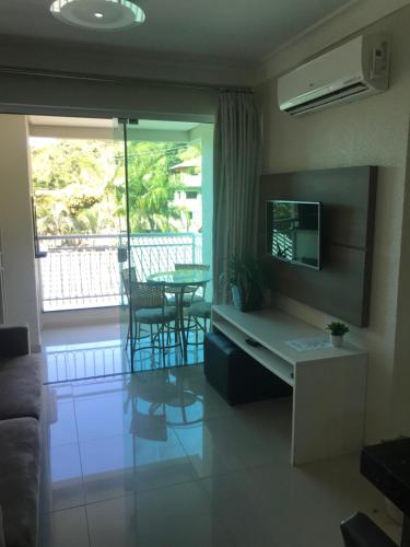 TV/trung tâm giải trí tại Resort e Spa Summer Beach Bombinhas apto 107