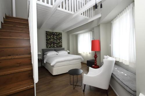 Postel nebo postele na pokoji v ubytování Hotel Metropolis