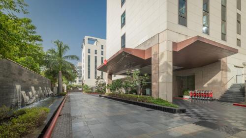 an empty street in front of a building at ibis New Delhi Aerocity - An Accor Brand in New Delhi