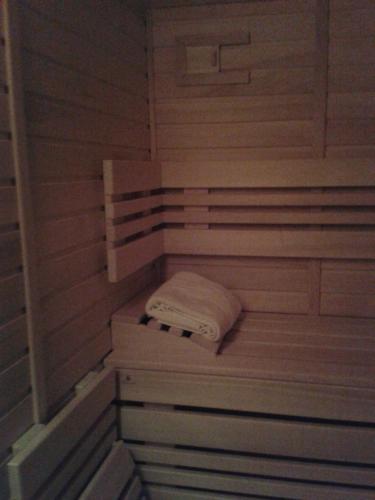 a sauna with a white towel sitting in it at Cihlářská bouda, apartmán 307 in Cerny Dul