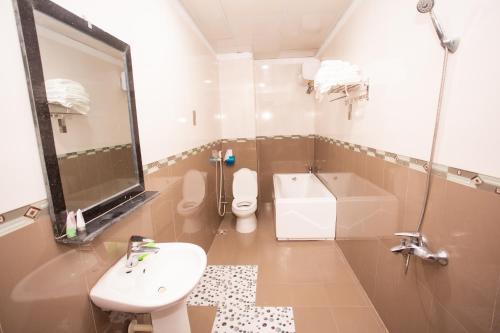 Koupelna v ubytování Amazing Hotel, Trương Pháp, Quang Phú, Đồng Hới
