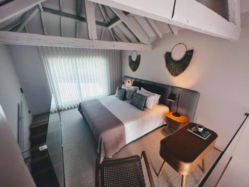 Postel nebo postele na pokoji v ubytování Casas Bouça Maria - Aqua Village & Sports