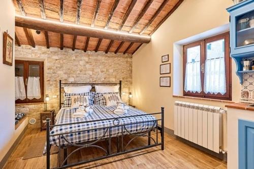 Letto o letti in una camera di La casina di Iole