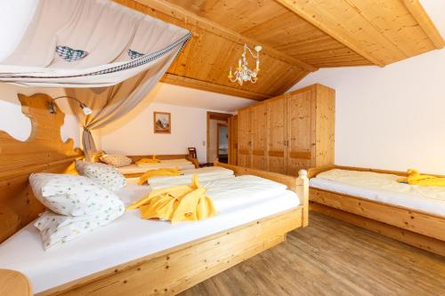 Postel nebo postele na pokoji v ubytování Romantikferienhaus am Brändle