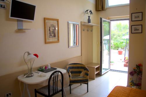 TV a/nebo společenská místnost v ubytování b&b il villino