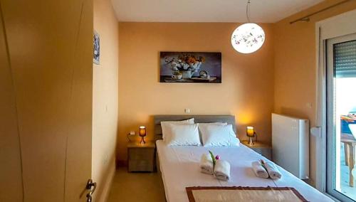 A bed or beds in a room at Dreamy Home by the Sea