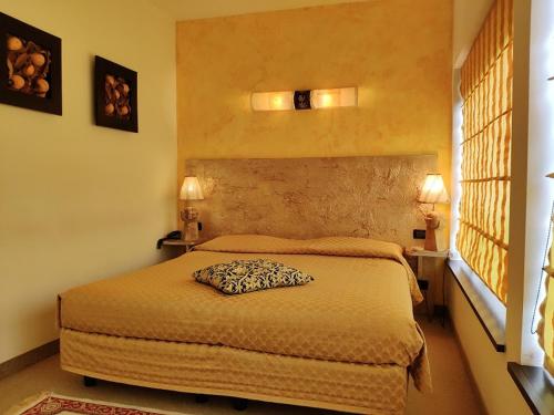 Cama o camas de una habitación en Hotel Feel Inn Venice Airport Rooms