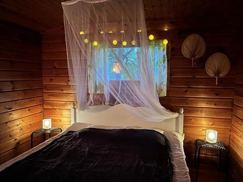 Postel nebo postele na pokoji v ubytování Kyyjärvi Camping Oy