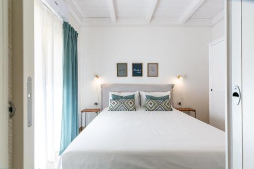 Ένα ή περισσότερα κρεβάτια σε δωμάτιο στο Casa Titina