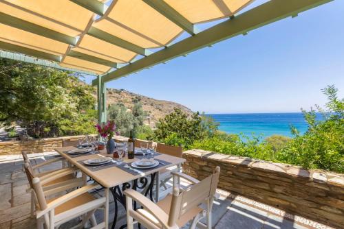 Sun-rock house by the sea by Andros Villas Collection