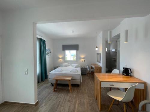 Ένα ή περισσότερα κρεβάτια σε δωμάτιο στο Maria Elena - Suite Home