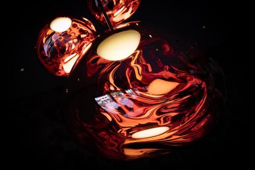 a close up of a glass vase with flames at Hotel Schweizerhof Lenzerheide in Lenzerheide
