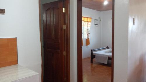 Postel nebo postele na pokoji v ubytování Casa James Apartment, Rooms , Pool and Restaurant