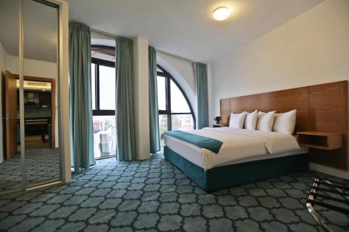 Letto o letti in una camera di Khuttar Apartment
