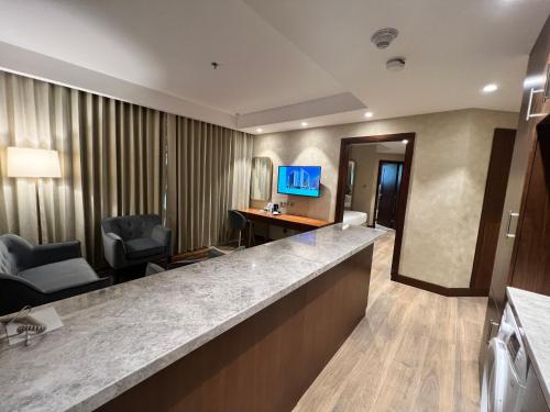 TV o dispositivi per l'intrattenimento presso City Seasons Suites