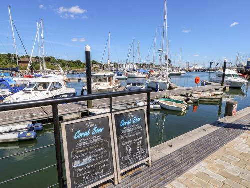 a marina with many boats in the water at Lymington Lodge in Lymington